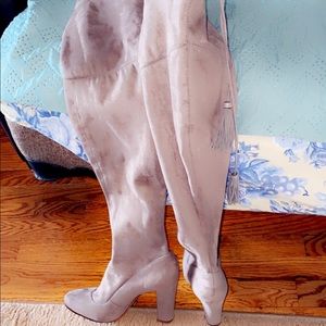 Knee high patted heeled boots